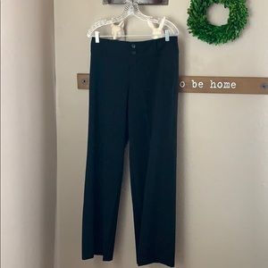 Women’s black trousers.